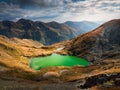 Panoramic view of Carpathian Mountains with green lake. Royalty Free Stock Photo