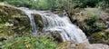 Panoramic view of the cascading and splashing water of the Aira falls