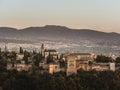 Panoramic view of the castle Alhambra in Granada, Andalusia, Spain, during sunset, from the Mirador de la Cruz de Rauda Royalty Free Stock Photo