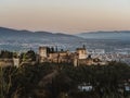 Panoramic view of the castle Alhambra in Granada, Andalusia, Spain, during sunset, from the Mirador de la Cruz de Rauda Royalty Free Stock Photo