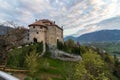 Panoramic view on Castle Schenna Scena near Meran during sunset. Schenna, Province Bolzano, South Tyrol, Italy