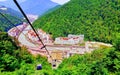 Panoramic view of Caucasian mountains under blue cloudy sky Royalty Free Stock Photo