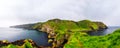 Panoramic view of a Causeway coast and gents with Kinbane castle and sea Royalty Free Stock Photo