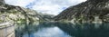 Panoramic view of the Cavallers reservoir surrounded by high mountains, river Noguera de Tor in Ribagorza, BoÃÂ­ valley, Pyrenees