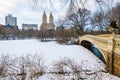 Panoramic view of Central Park Bow bridge and Upper West side in winter Royalty Free Stock Photo