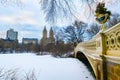 Panoramic view of Central Park Bow bridge and Upper West side in winter Royalty Free Stock Photo