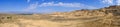 Panoramic view of Charyn national park in Kazakhstan. Clouds background. Beautiful sand stone formations. Soil errosion. Royalty Free Stock Photo