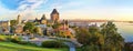 Panoramic view of Chateau Frontenac surrounded by greenery in Old Quebec, Canada at sunrise Royalty Free Stock Photo