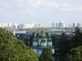 Panoramic view of the church on the background of the river of the modern city in the distance Royalty Free Stock Photo