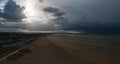 The panoramic view of the city and the beach of Ouistreham at the edge of the English Channel in Europe, France, Normandy, in Royalty Free Stock Photo