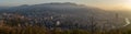 Panoramic view of the city of Bilbao from Mount Artxanda at sunset with a light mist on the horizon Royalty Free Stock Photo