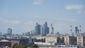 Panoramic view of city and blue skyscrapers. Action. Simple view of city on background of high-rise buildings in Moscow