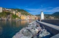 Panoramic view of city of Camogli with the lighthouse, Genoa Province, Liguria, Mediterranean coast, Italy Royalty Free Stock Photo