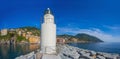 Panoramic view of city of Camogli with the lighthouse, Genoa Province, Liguria, Mediterranean coast, Italy Royalty Free Stock Photo