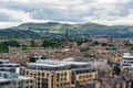 Panoramic view of the city of Edinburgh from the top of the castle with the mountains in the background, Scotland. Royalty Free Stock Photo