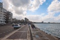 Panoramic view of the city Embankment and the Port with Road, Buildings, Cars and Palm Trees in Alexandria, Egypt