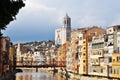 Panoramic view of the city of Girona. River Ter, residential buildings on the embankment and a bridge across the river.