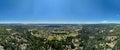 Panoramic view of the city and surrounding forests in daylight in Longview, Washington. Aerial shot. Royalty Free Stock Photo