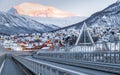 Panoramic view of the city of Tromso in winter at sunrise, North Norway. View from the bridge.