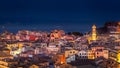 Panoramic view of the citylights of Corfu Town at night