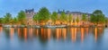 Panoramic view and cityscape of Amsterdam with boats, old buildings and Amstel river, Holland, Netherlands Royalty Free Stock Photo