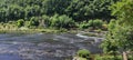 Panoramic view of the clean and beautiful river Una near the town of Bihac, Bosnia and Herzegovina. Una National Park. Royalty Free Stock Photo