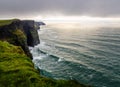 Panoramic view of the Cliff of Moher in a cloudy wintery day, Ireland Royalty Free Stock Photo