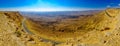 Panoramic view of cliffs, landscape, and road, Makhtesh crater Ramon Royalty Free Stock Photo