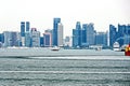 Panoramic view of the coastline of the city of Singapore from the sea and the strait.