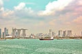 Panoramic view of the coastline of the city of Singapore from the sea and the strait.