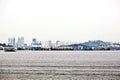 Panoramic view of the coastline of the city of Singapore from the sea and the strait.