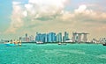 Panoramic view of the coastline of the city of Singapore from the sea and the strait.