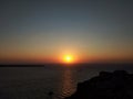 Panoramic view of colorful sunset over the sea. Oia, Santorini, Greece. Royalty Free Stock Photo