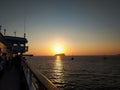 Panoramic view of colorful sunset over the sea. Oia, Santorini, Greece. Royalty Free Stock Photo