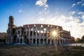 Panoramic view of the Colosseum with sun beams Royalty Free Stock Photo