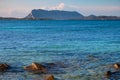 Costa Smeralda coast of Tyrrhenian Sea and Isola Tavolara island seen from San Teodoro resort town in Sardinia, Royalty Free Stock Photo