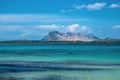 Costa Smeralda coast of Tyrrhenian Sea and Isola Tavolara island seen from San Teodoro resort town in Sardinia, Royalty Free Stock Photo