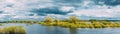 Panoramic View Countryside Landscape During Spring Flood Floodwaters. Tranquil Bold Bright Blue Sky Above Nature