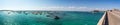 Panoramic View of the  Crab Island Park in a Sunny Day with Several Small Boats in the Sea Royalty Free Stock Photo