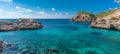 Panoramic view of crystalline turquoise waters of Cala s`Almunia beach from cap des moro. Majorca, Spain Royalty Free Stock Photo