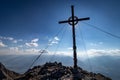 Mountain summit cross with panoramic view