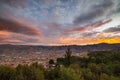 Panoramic view of Cusco town with glowing cloudscape and colorful sky at dusk. Cusco is among the most important travel destinatio Royalty Free Stock Photo