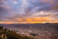 Panoramic view of Cusco town with glowing cloudscape and colorful sky at dusk. Cusco is among the most important travel destinatio Royalty Free Stock Photo