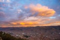 Panoramic view of Cusco town with glowing cloudscape and colorful sky at dusk. Cusco is among the most important travel destinatio Royalty Free Stock Photo