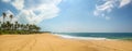 Panoramic view of deserted yellow sand beach of Sri Lanka