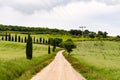 Panoramic view of the a dirt road in Val d'Orcia Royalty Free Stock Photo