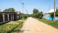 panoramic view of dirty road in Akhtyrka village Royalty Free Stock Photo