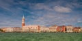 Panoramic view of Doge Palace, Campanile and San Marco square from Grand Canal main water area during evening warm sunset, Venice Royalty Free Stock Photo