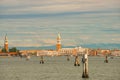 Panoramic view of Doge Palace, Campanile and San Marco square from Grand Canal main water area during evening warm sunset, Venice Royalty Free Stock Photo