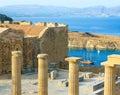 Panoramic view of Doris Temple of Athena Lindia, medieval castle on Acropolis of Lindos with blue bay beneath, Rhodes Royalty Free Stock Photo